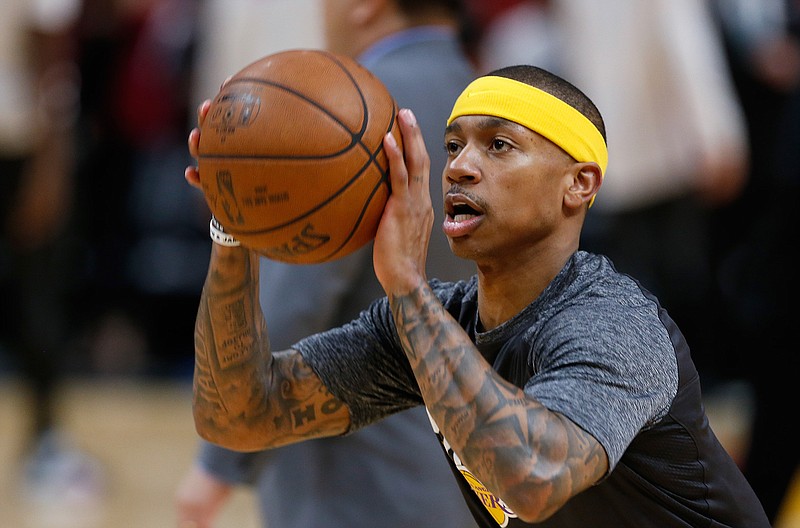 Los Angeles Lakers guard Isaiah Thomas warms up for the team's NBA basketball game against the Miami Heat, Thursday, March 1, 2018, in Miami. (AP Photo/Wilfredo Lee)