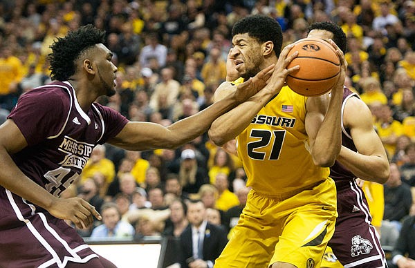 Jordan Barnett of Missouri pulls the ball away from Mississippi State's E.J. Datcher during a game last month at Mizzou Arena.