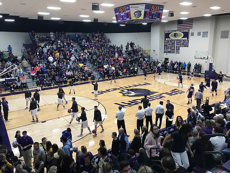 Players warm up Saturday, March 3, 2018 at Salisbury High School, where Chamois went on to earn a 51-48 win against Slater in the Class 1 quarterfinal round.