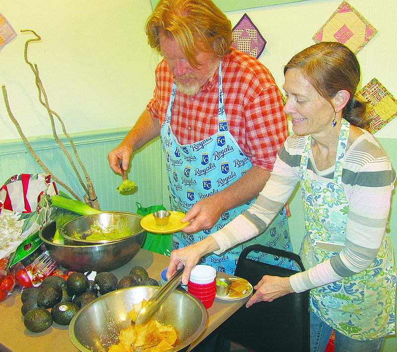 Dan and Rachael Dodson serve samples of their award-winning guacamole Sunday at their Downtown Diner. The couple recently won their division and placed second overall in the 15th annual Guacamole Bowl in San Diego, California.