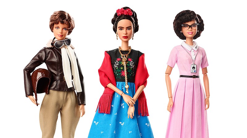 This product image released by Barbie shows dolls in the image of pilot Amelia Earhart, left, Mexican artist Frida Khalo and mathematician Katherine Johnson, part of the Inspiring Women doll line series being launched ahead of International Women’s Day. (Barbie via AP)