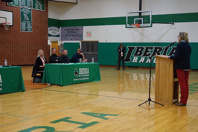 Iberia librarian Carolyn Beal speaks to the Board of Education Tuesday, March 6, 2018 about the possibility of arming teachers during a public comment at a meeting in the high school gymnasium.