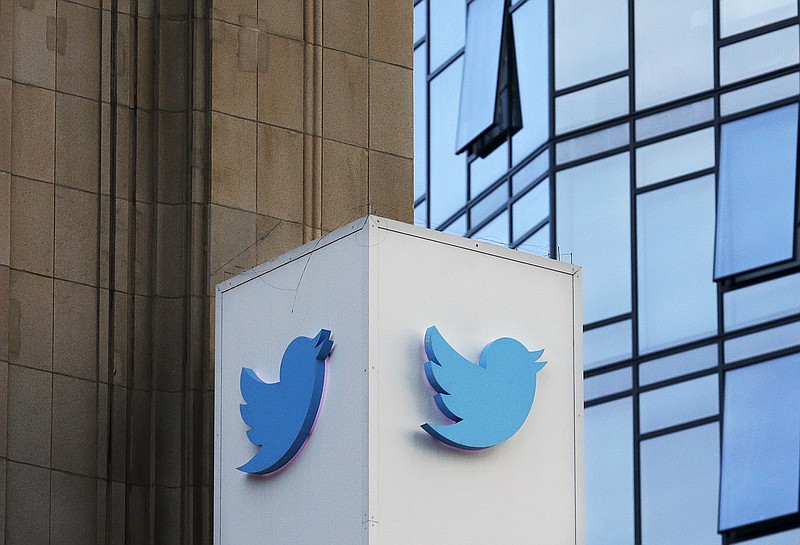 FILE - This Oct. 26, 2016 file photo shows a Twitter sign outside of the company's headquarters in San Francisco. A new study published Thursday, March 8, 2018, in the journal Science shows that false information on the social media network travels six times faster than the truth and reaches far more people.   (AP Photo/Jeff Chiu), File