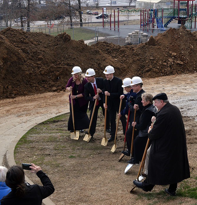 Dignitaries from Jefferson City, the Catholic Diocese and St. Joseph Cathedral School were on hand Wednesday for the groundbreaking of the school's new gymnasium and performing arts center. Around $1.75 million was raised for the new facilities, and work is expected to be complete in mid-October.