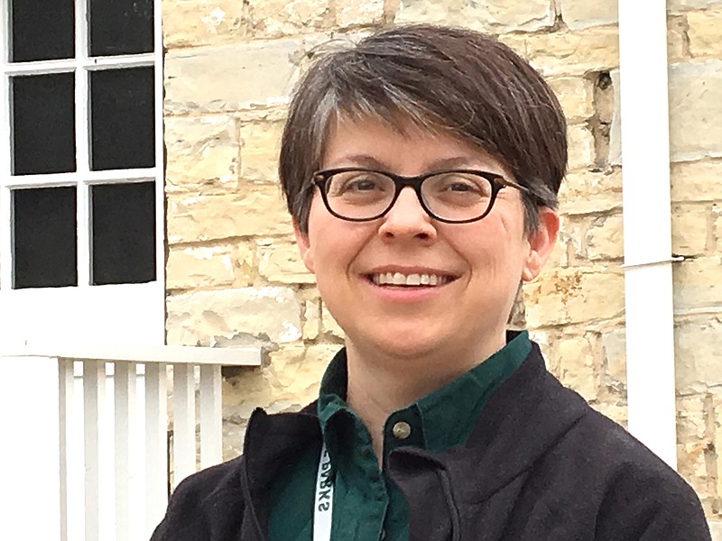 Missouri State Museum Director Tiffany Patterson poses outside the Lohman Building at the Jefferson Landing State Historic Site. 