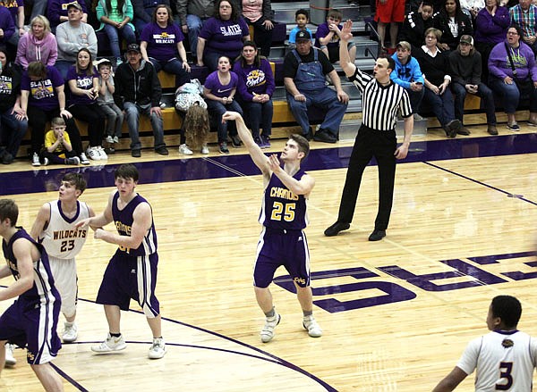 Chamois senior Charles Roberts follows through as he watches his 3-point shot go through the net during the final seconds of last Saturday's Class 1 quarterfinal game against Slater at Salisbury.