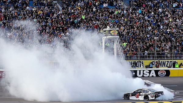 Kevin Harvick performs a burnout after winning a NASCAR Cup series race last Sunday in Las Vegas.