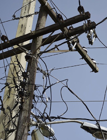 News Tribune file photo of a utility pole and lines.