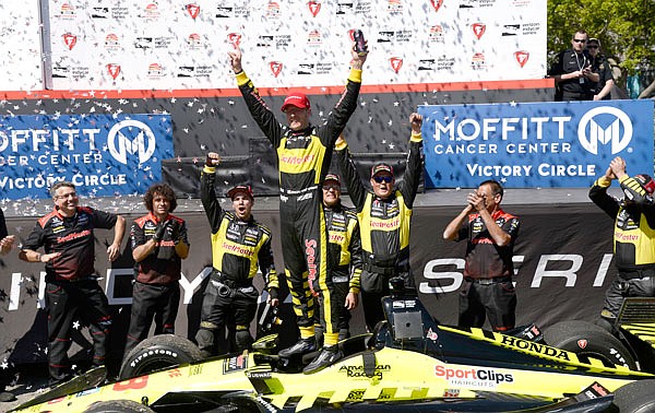 Sebastien Bourdais (center) celebrates after winning the IndyCar Firestone Grand Prix of St. Petersburg on Sunday in St. Petersburg, Fla.