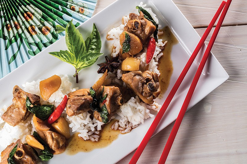 Three-cup chicken gets its name from the three equal portions of sesame oil, soy sauce and rice wine traditionally used to make the sauce. Styled by Mark Graham. (Zbigniew Bzdak/Chicago Tribune/TNS)