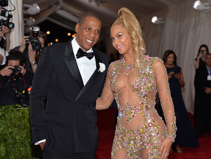 Jay-Z and Beyonce arrive at The Metropolitan Museum of Art's Costume Institute benefit gala on May 4, 2015, in New York. The pair have announced they'll hit the road together this summer and fall for their "On the Run II" stadium tour.
