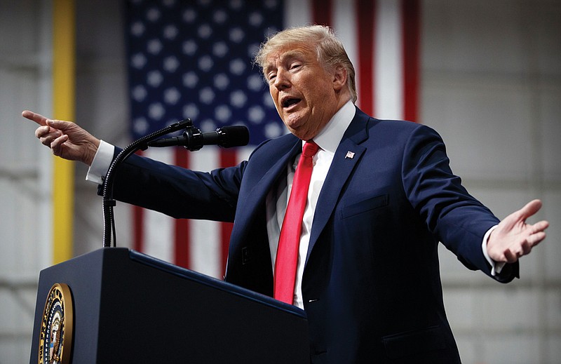 President Donald Trump speaks at a campaign rally in Moon Township, Pa. Over the weekend, the White House released a limited plan to combat school shootings that leaves the question of arming teachers to states and local communities and sends the age issue to a commission for review.