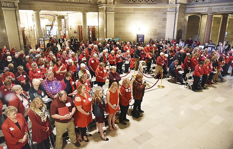 About 200 pro-life supporters, many of them clad in red shirts, gathered Tuesday in the Capitol Rotunda for a rally.