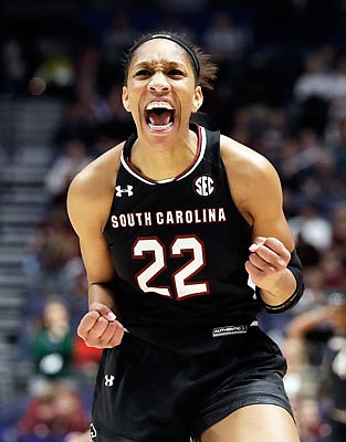 A'ja Wilson celebrates after South Carolina's win against Mississippi State in SEC Tournament title game earlier this month in Nashville, Tenn.