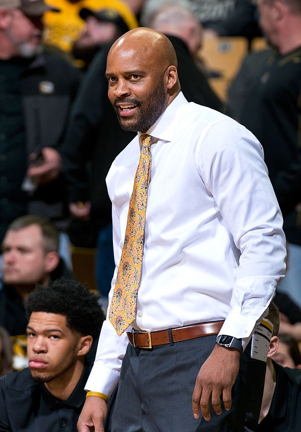 Missouri head coach Cuonzo Martin smiles as he watches his team play during the first half of a game against Texas A&M on Feb. 13 at Mizzou Arena.
