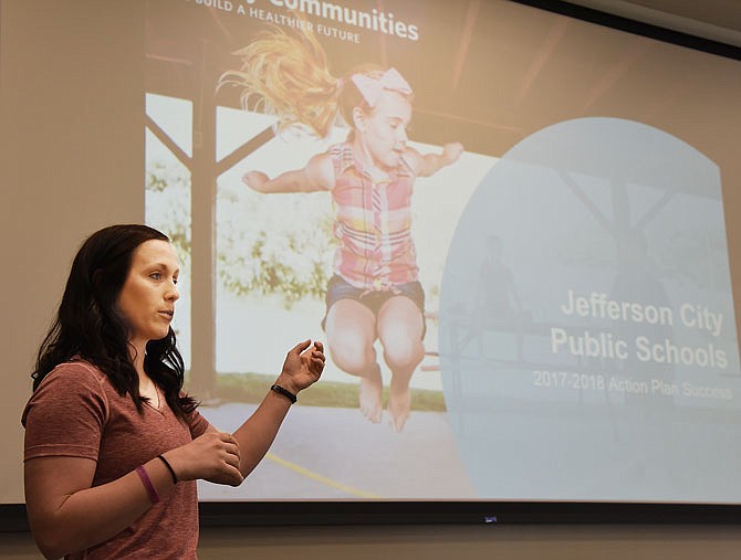 Healthy Schools coordinator Kelsey Chrisman talks about the early success of the program in the four Jefferson City Public Schools. She addressed a group Friday morning made up of individuals from city, county and state agencies who hold an interest in helping students to eat right and exercise.