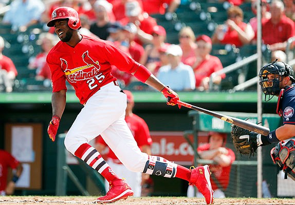 Dexter Fowler, shown here in an at-bat in an exhibition game earlier this month against the Twins in Jupiter, Fla., will bat leadoff for the Cardinals this season.