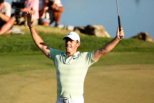 Rory McIlroy celebrates after sinking a birdie putt on the 18th hole on is way to a win Sunday in the Arnold Palmer Invitational at Bay Hill Club & Lodge in Orlando, Fla.
