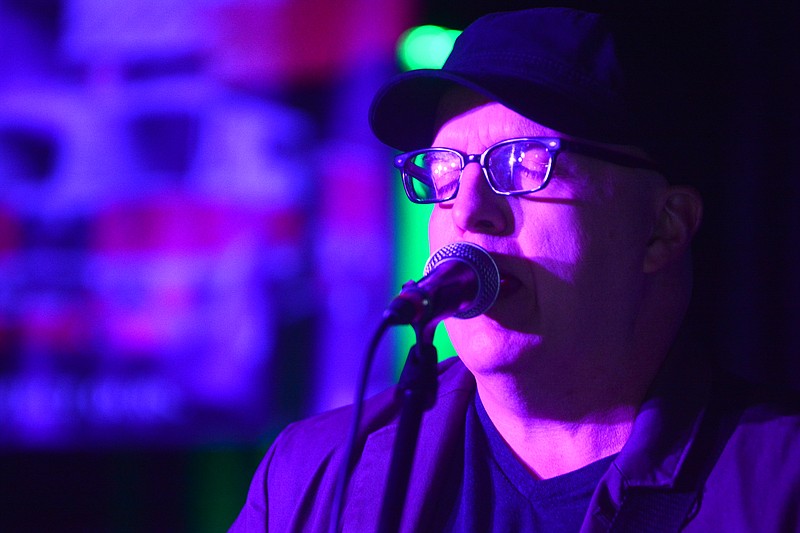 Collin Krabbe/News Tribune
John Gilbraith, of the John Gilbraith Trio, sings during Battle 4 the Badges on Saturday at The Bridge in Jefferson City. The event was hosted by Safety Net, an orgnization providing resources to the families of first responders lost in the line of duty. Gilbraith's band ended up garnering the most votes and will be playing in the final round of the competition.