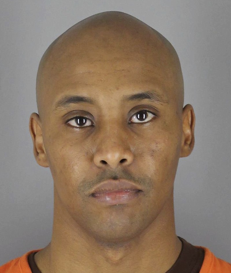 This March 20, 2018 photo provided by the Hennepin County Sheriff's Office in Minneapolis, Minn., shows Minneapolis Police Officer Mohamed Noor, after he turned himself in to the Hennepin County Jail. Noor was charged Tuesday with third-degree murder and second-degree manslaughter in the shooting death of an unarmed Australian woman, Justine Ruszczyk Damond, last July, minutes after she called 911 to report a possible sexual assault behind her home in Minneapolis. (Hennepin County Sheriff's Office via AP)