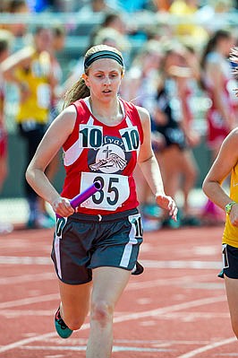 Allison Procter of Calvary Lutheran runs a leg of the 4x800-meter relay during last year's state championships at Adkins Stadium.