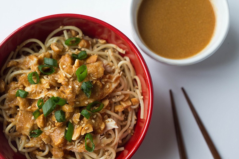 Cold noodles with chicken and peanuts garnished with scallions on Wednesday, Feb. 28, 2018 in St. Louis, Mo. (Austin Steele/St. Louis Post-Dispatch/TNS)