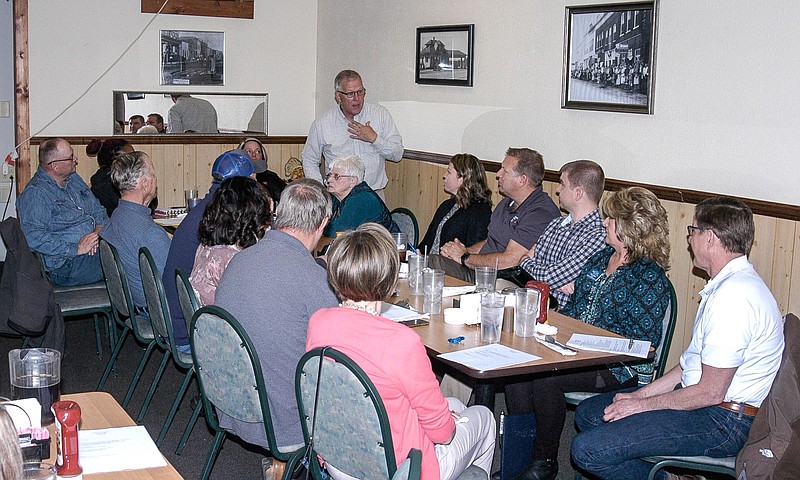 <p>Democrat photo / David A. Wilson</p><p>The board of directors and some of the members of the Moniteau County Regional Economic Development Council discuss the changes to be proposed at the annual meeting in April.</p>