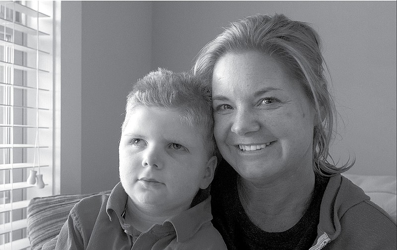  Tripp Halstead, left,  and his mother Stacy
