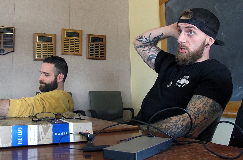 University of Vermont student veterans Thomas Moore, left, and Dan Wright, participate in a class studying Homer's "The Iliad" and "The Odyssey." 