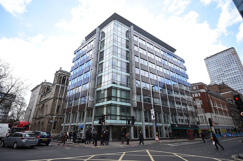 The offices of Cambridge Analytica (CA) in central London, after it was announced that Britain's information commissioner Elizabeth Denham is pursuing a warrant to search Cambridge Analytica's computer servers, Tuesday March 20, 2018.  Denham said Tuesday that she is using all her legal powers to investigate Facebook and political campaign consultants Cambridge Analytica over the alleged misuse of millions of people's data. Cambridge Analytica said it is committed to helping the U.K. investigation. (Kirsty O'Connor/PA via AP)