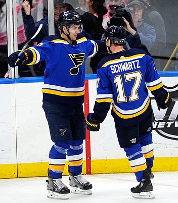 Jaden Schwartz celebrates his overtime goal with Blues teammate Brayden Schenn in Wednesday night's 2-1 win against the Bruins in St. Louis.