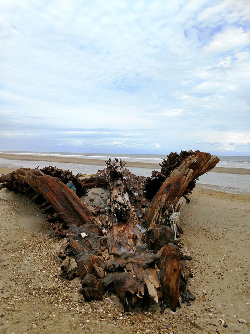 This March 19, 2018, photo, the remains of the G.A. Kohler lie near the surf close to Ramp 27 north of Avon, N.C. Recent storms have exposed Outer Banks shipwrecks.