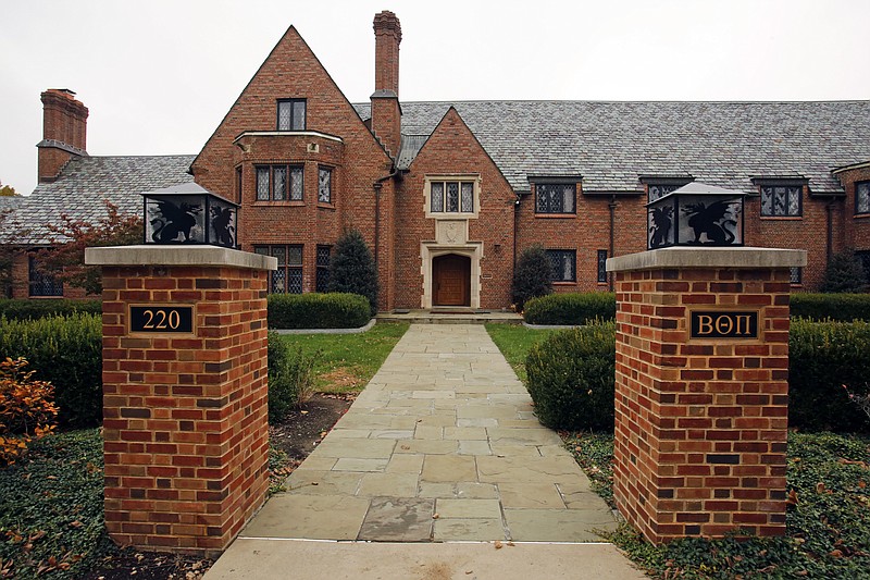 FILE--This file photo from Nov. 9, 2017 shows the Beta Theta Pi fraternity house on the Penn State University main campus in State College, Pa. On Feb. 4, 2017, 19-year-old fraternity pledge Tim Piazza drank heavily at a pledge party, then fell head-first down basement stairs, the first of several tumbles that left him mortally injured. A preliminary hearing set to begin on Friday, March 23, 2018, at the courthouse near campus involves 11 of the 26 young men charged in connection with the February 2017 death of 19-year-old Tim Piazza, of Lebanon, New Jersey.(AP Photo/Gene J. Puskar, FILE)