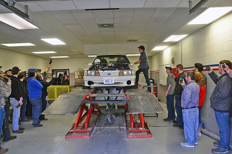 Dozens of people observed sports cars Saturday during Dyno Day at State Technical College in Linn, where cars and trucks were tested by measuring horsepower and torque.