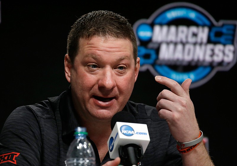 Texas Tech coach Chris Beard speaks during a news conference at the NCAA men's college basketball tournament, Saturday, March 24, 2018, in Boston. Texas Tech will face Villanova in a regional final on Sunday. (AP Photo/Elise Amendola)