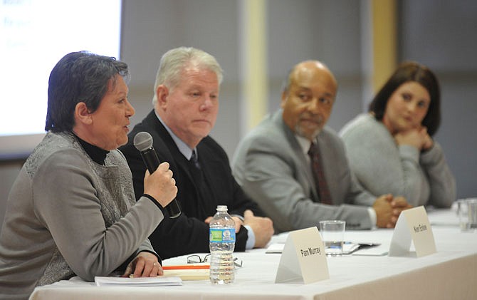 From right, Lindsey Rowden, Michael Couty and Ken Enloe listen as Pam Murray answers a question during a forum Monday evening in Scruggs Student Center on Lincoln University's campus. All four are candidates for the Jefferson City Public Schools Board of Education.