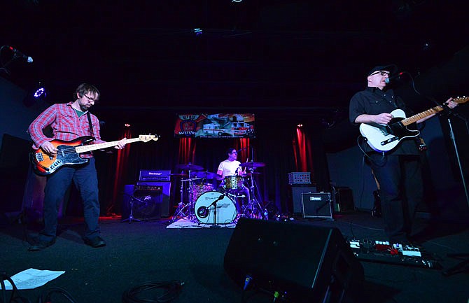 The John Gilbraith Trio performs Saturday during Bands Battle 4 the Badges competition finals at The Bridge. The band won over Dark Below, Travis Feutz and Chemical Mass.