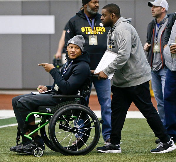 Steelers linebacker Ryan Shazier is pushed along the field as some players from the University of Pittsburgh take part in the team' annual pro day Wednesday, March 21, 2018, in Pittsburgh.