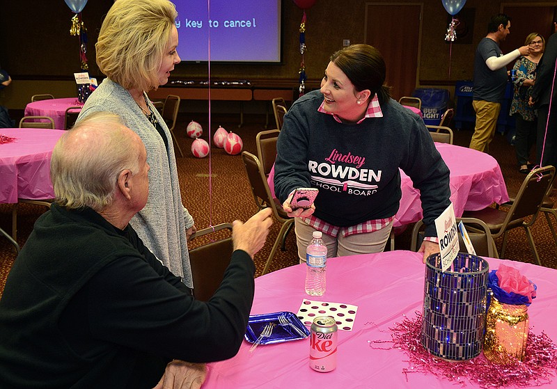 Lindsey Rowden, surrounded by family, friends and supporters, wait for election returns during a watch party Tuesday, April 3, 2018, at NH Scheppers Distributing Co. in Jefferson City.