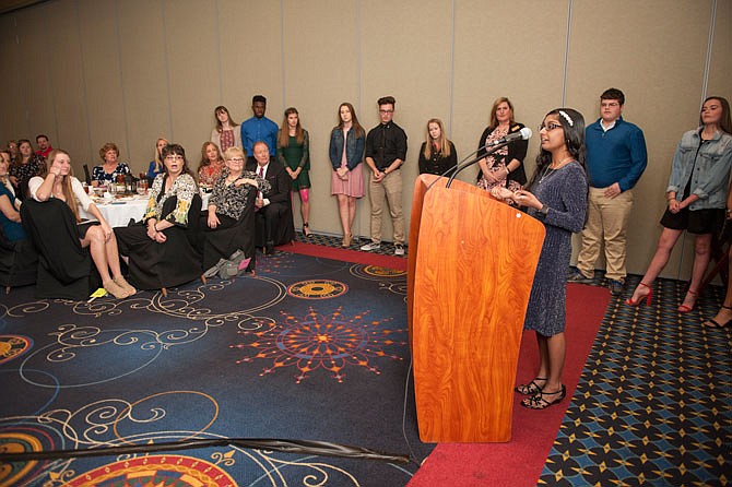 Ragavi Premnath speaks Thursday during the Council for Drug Free Youth's annual banquet about her experiences in the Safety Kids and Show Me Players during her time in elementary and middle school, and the impact being a part of those groups had on her. 