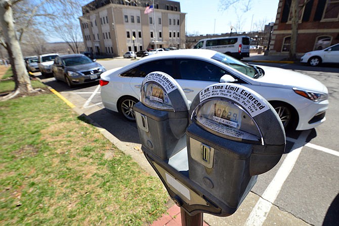 The city's Transportation and Traffic Commission approved permanently keeping the 100 block of Madison Street four-hour parking. It had been temporarily changed from two-hour parking in January as a trial.