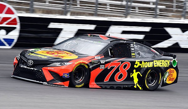 Martin Truex Jr. comes out of Turn 4 during a practice session Friday for a NASCAR Cup Series race in Fort Worth, Texas.