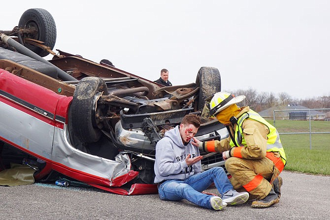 No students were harmed in the making of this mock crash scene at New Bloomfield High School, including Nick Hammann, the senior who played the part of a drunk driver. Student Council members arranged the demonstration to warn their peers about the dangers of driving while intoxicated.