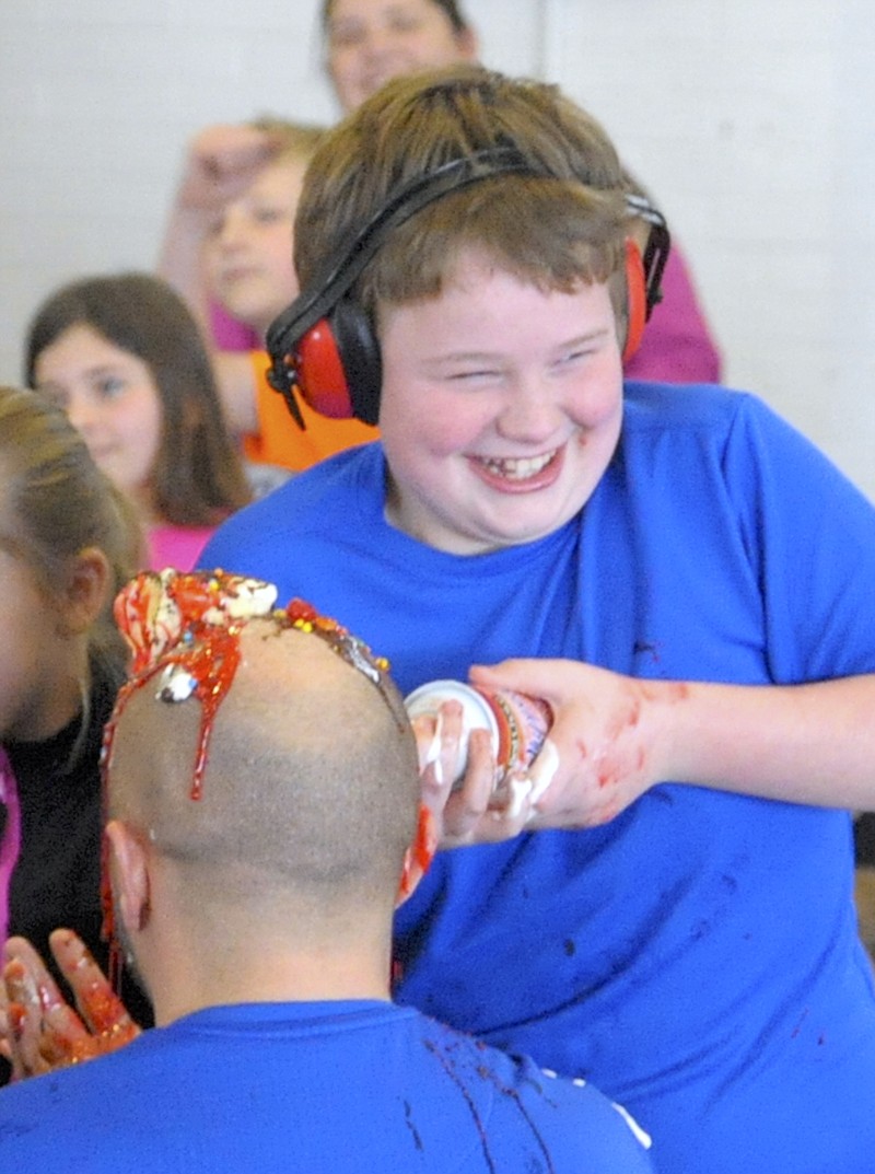 <p>Democrat photo/Michelle Brooks</p><p>Students enjoyed making “principal ice cream sundaes” April 9 as the reward for the school’s second annual read-a-thon.</p>