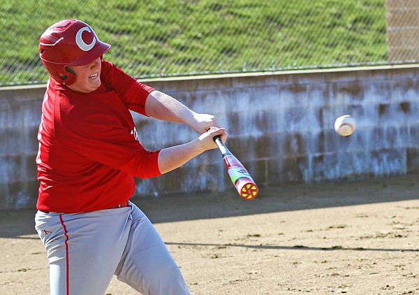 Nick Stark of Calvary Lutheran sends an RBI single to right field during the first inning of Tuesday's game against New Haven at Calvary Lutheran.