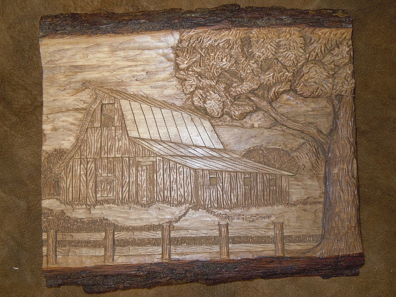 Shown is a wood carving piece by former Jefferson City councilman Cliff Olsen. He recently received several first-place awards at the Kansas City Elegance in Wood Show.