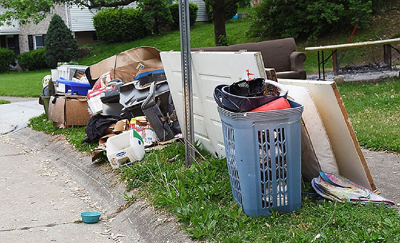 Not everything depicted in this April 2016 file photo is eligible for pickup during the annual bulky item collection event in Jefferson City. Items that will be picked up include furniture, large bulky items that two people can pick up, televisions, microwaves, tied bundles of scrap material under 4 feet, and mattresses. Items that will not be picked up include household trash, bags or boxes of debris, loose piles of materials, remodeling materials, appliances, yard waste, household hazardous waste, lumber or guttering more than 4 feet, rocks, bricks, concrete, flammable materials, acid batteries or car parts — including tires.