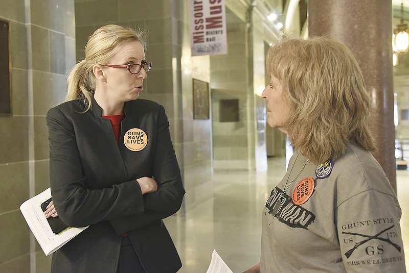 Wednesday saw a Gun Rights Rally in the Capitol Rotunda and one of its featured speakers was Alex Salsman, the political director for Missouri Firearms Coalition. Salsman, at left, visited with attendee Melody Noland, of Lexington, after speaking. She addressed about 100 gun rights supporters gathered to hear speakers then break to go visit their legislators.