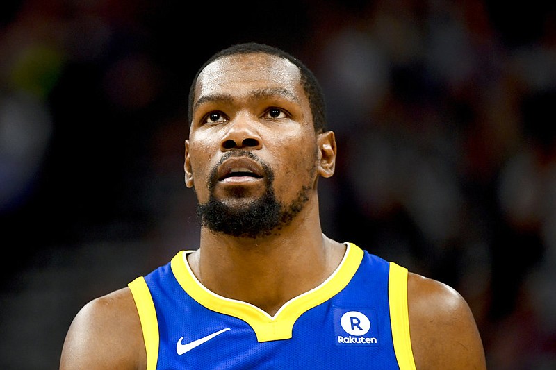 Golden State Warriors forward Kevin Durant (35) looks on in the second half of an NBA basketball game against the Utah Jazz Tuesday, April 10, 2018, in Salt Lake City. (AP Photo/Alex Goodlett)