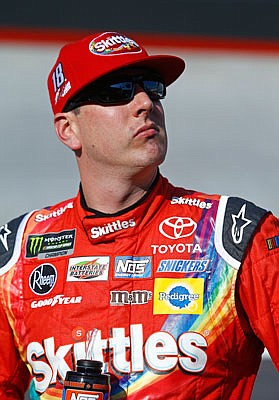Kyle Busch looks on after qualifying on the pole Friday in Bristol, Tenn.